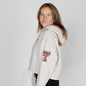 Texas Tech™ Embroidered Raiders Script Cropped Hoodie in Bone